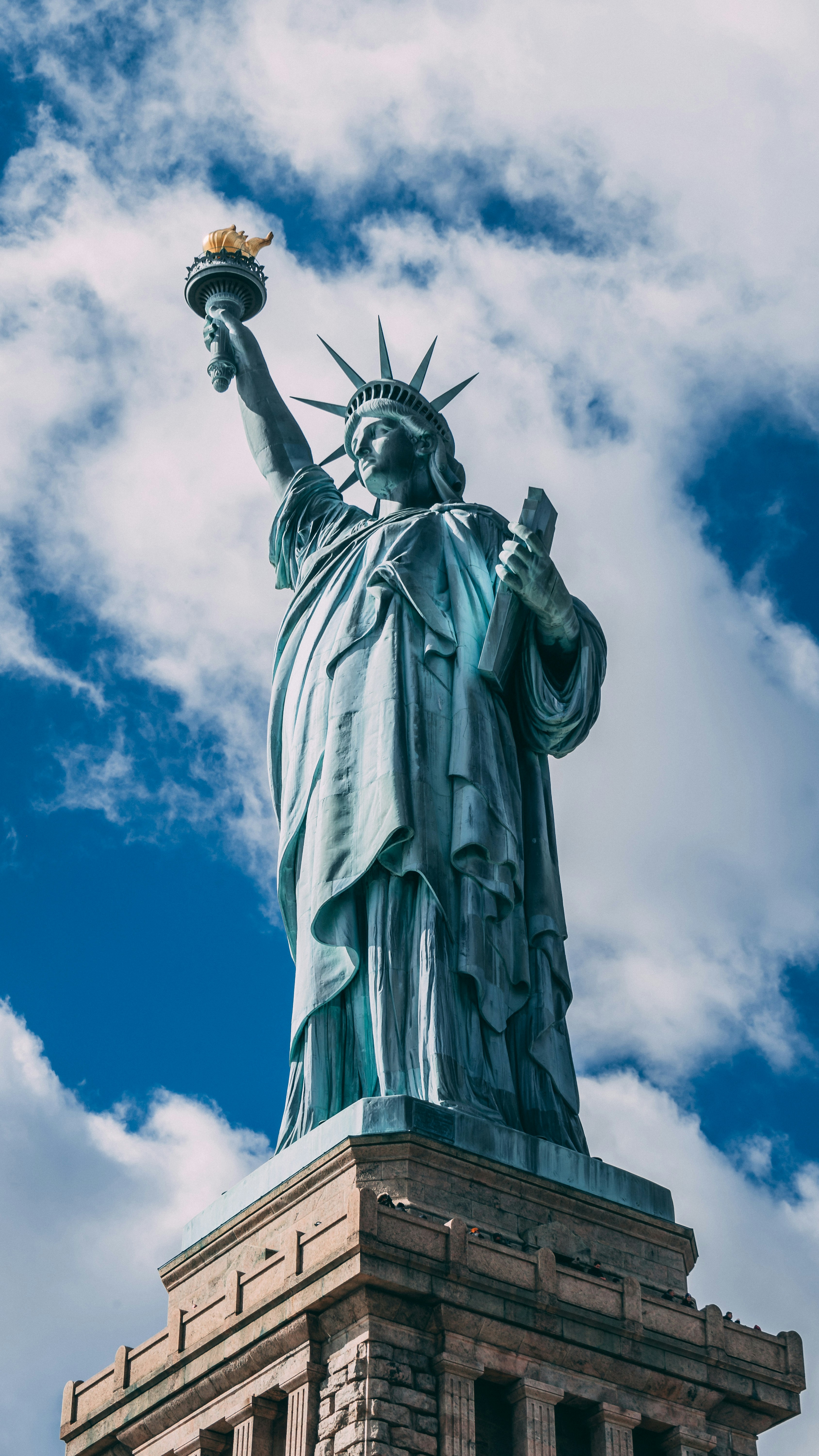 Statue of Liberty against a blue sky