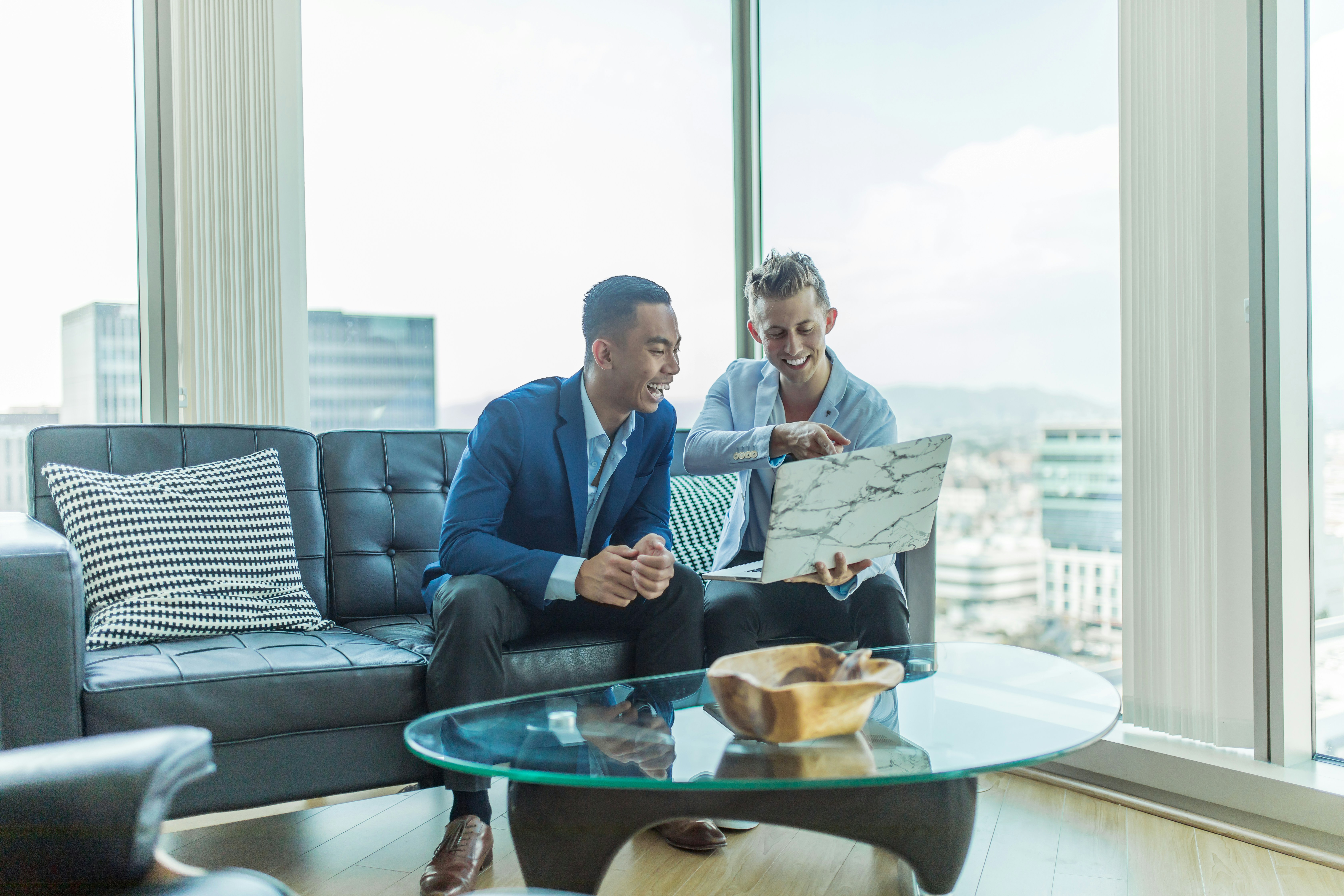 Professionals discussing business plans in a bright office