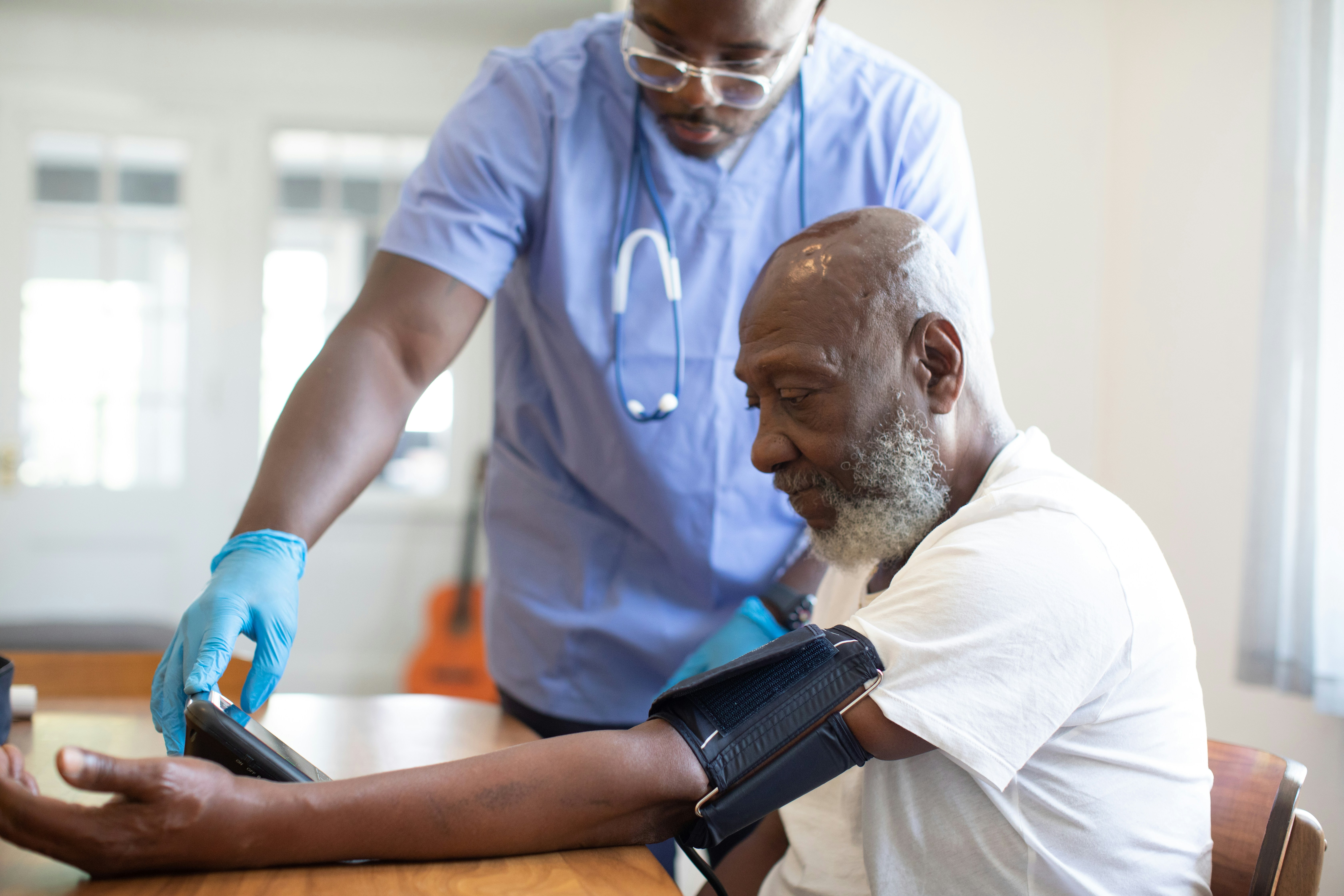 Medical professional caring for a patient during an exam