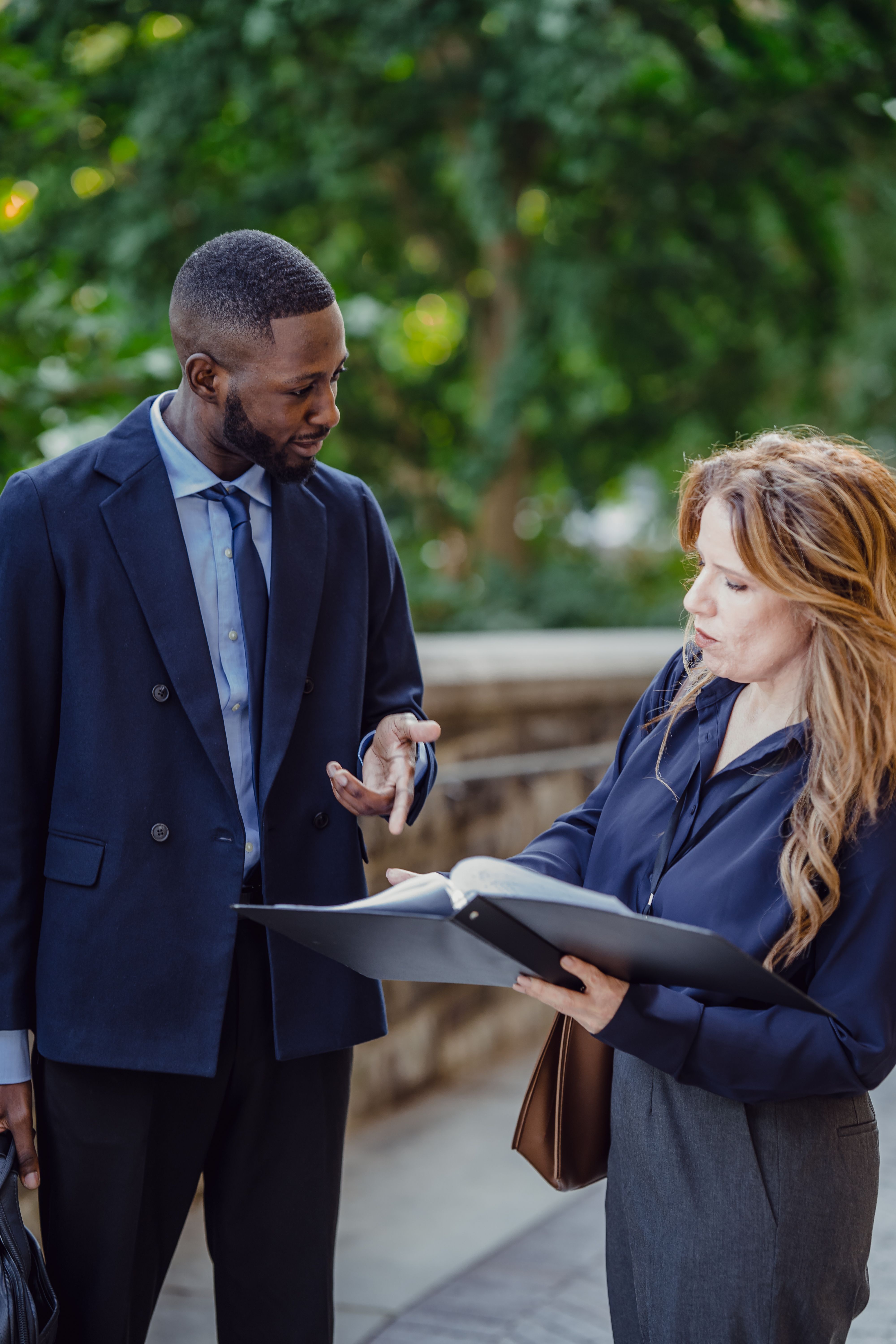 Attorney reviewing documents with a client in a calm setting