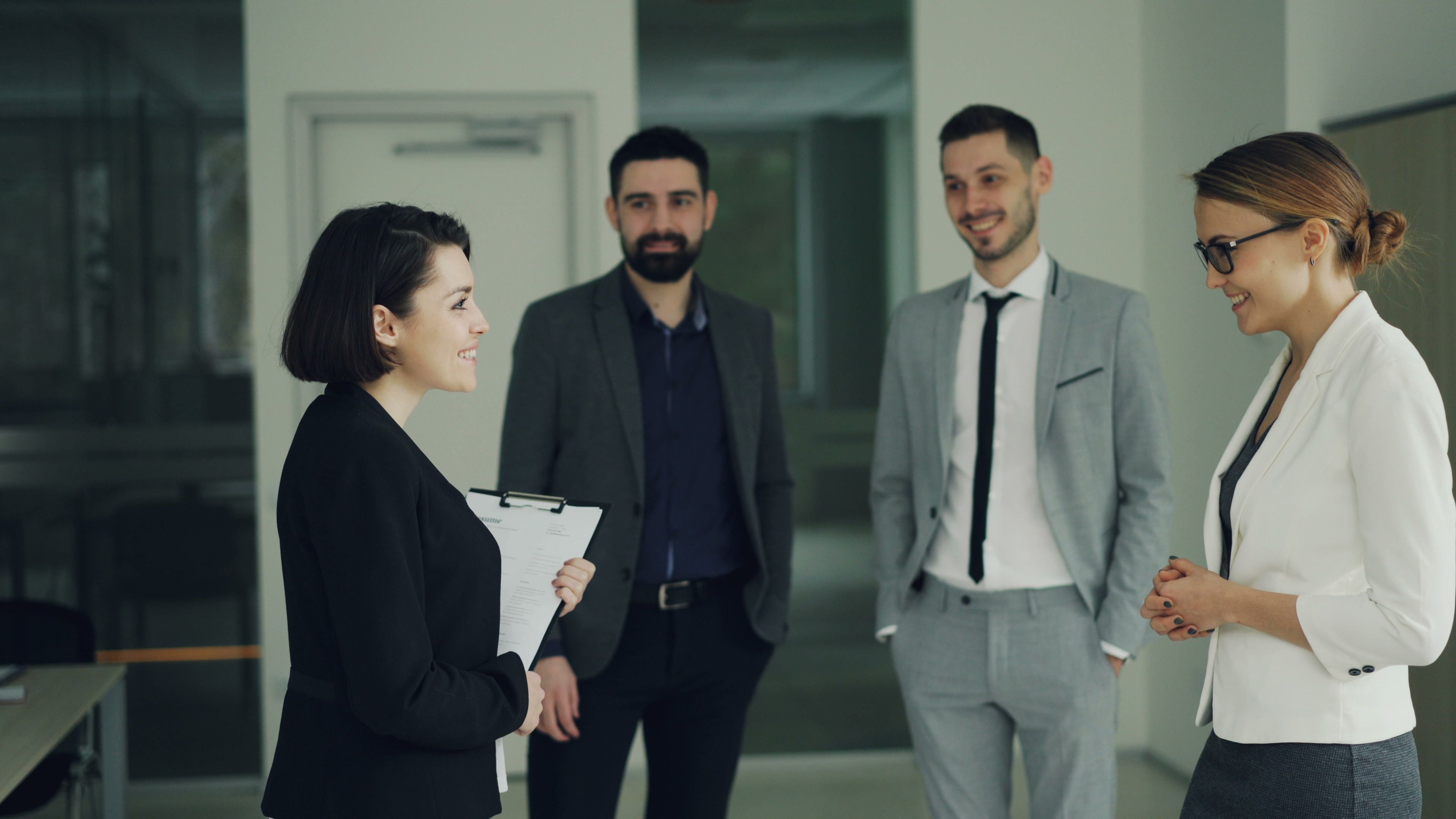 Professionals discussing a work matter in an office
